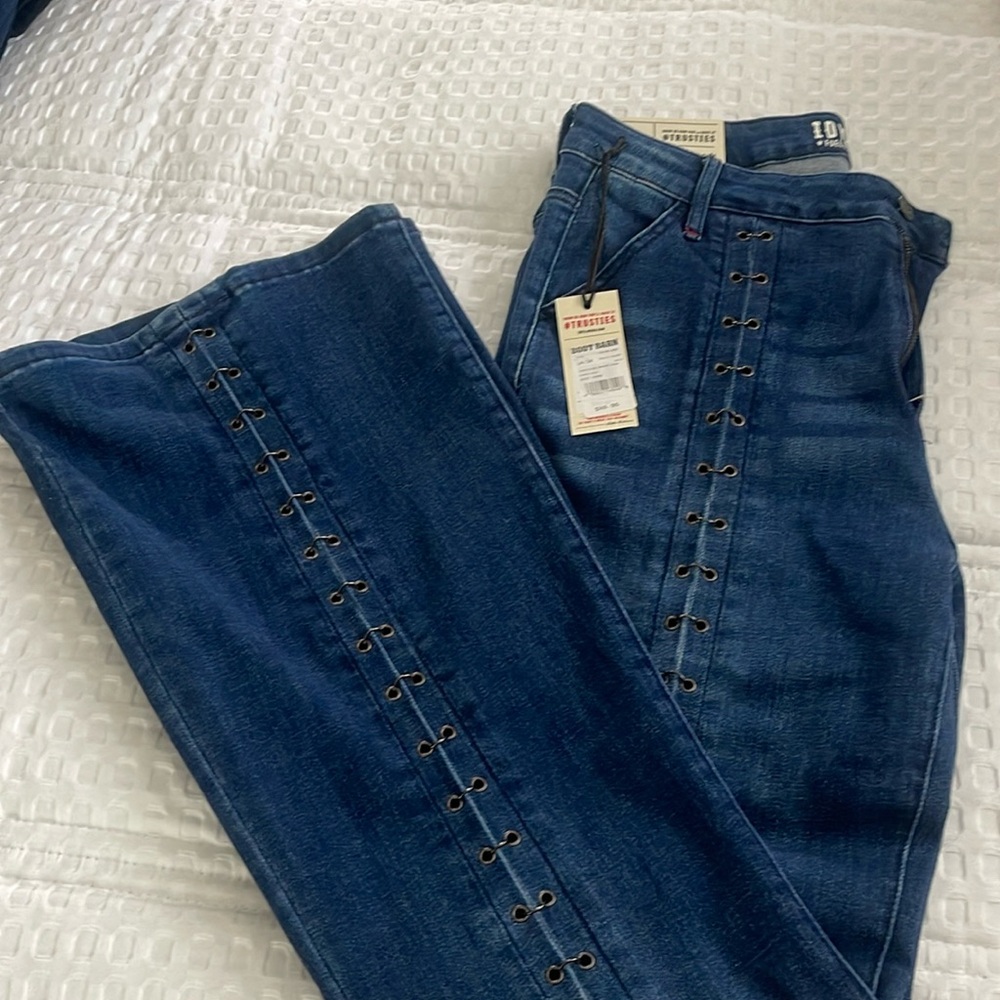 Idyllwind by Miranda Lambert flared jeans with metal accents.